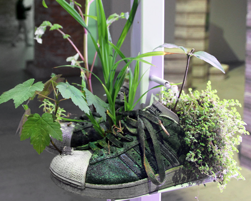 michel blazy repurposes sneakers as pot plants for the venice art biennale