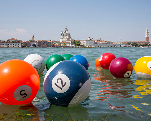 otto vincze's buoyed pool ball installation decorates the venetian lagoon