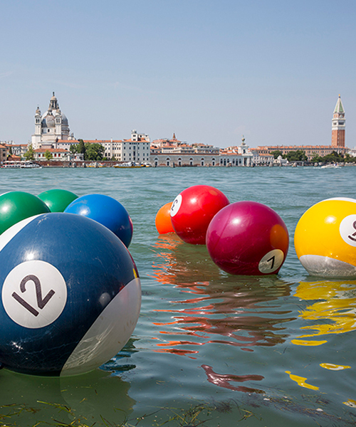 otto vincze's buoyed pool ball installation decorates the venetian lagoon
