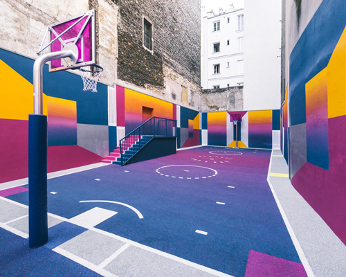 paris' pigalle basketball court canvassed in a gradient of smooth, iridescent hues