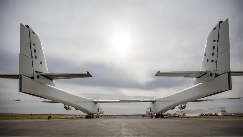 the stratolaunch, world's largest plane, emerges from hangar for first time
