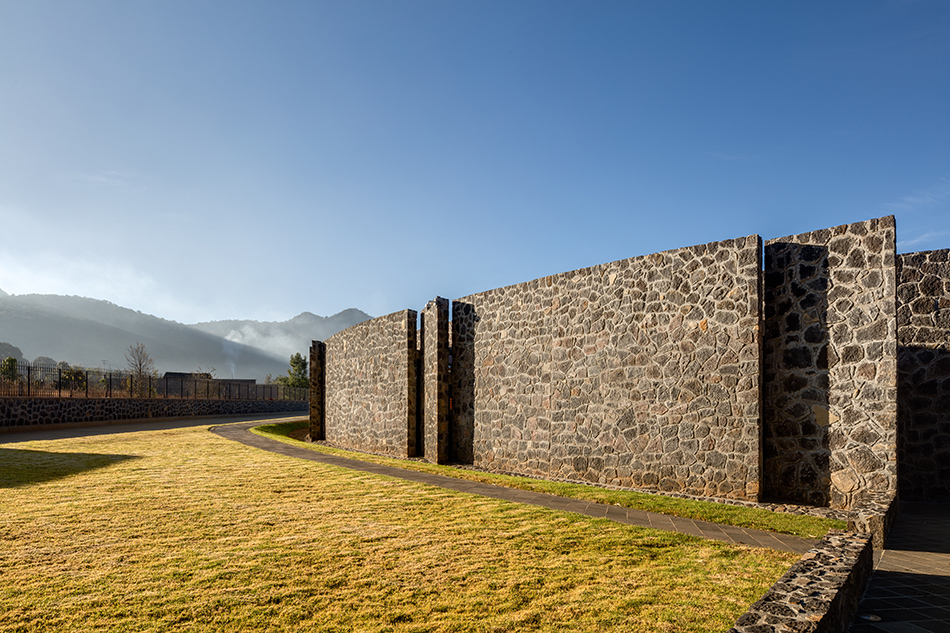 mauricio rocha + gabriela carrillo encircle courthouse in mexico with volcanic stone walls