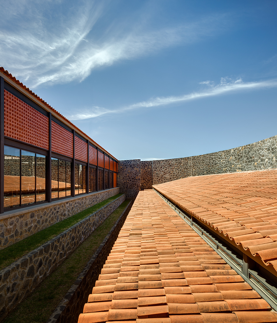 mauricio rocha + gabriela carrillo encircle courthouse in mexico with volcanic stone walls