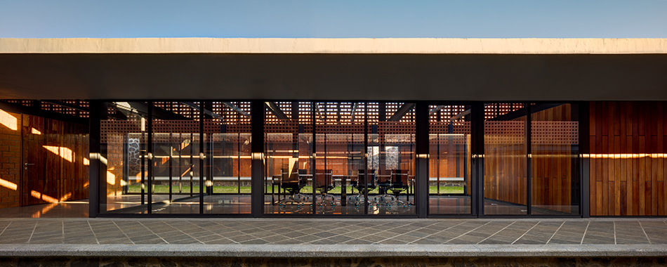 mauricio rocha + gabriela carrillo encircle courthouse in mexico with volcanic stone walls