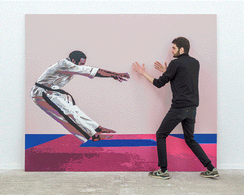 life-size art installation coaxes participants into completing the painting