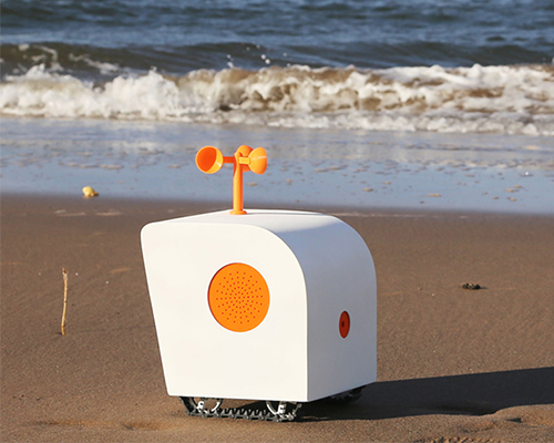 the AI-robot by yuxi liu writes poems on the beach