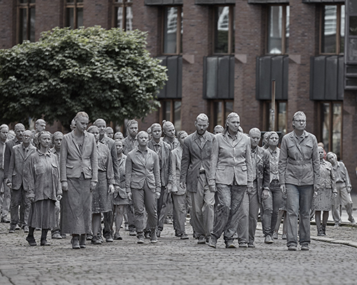 1000 ghostly figures march the streets of hamburg in protest for the G20 summit