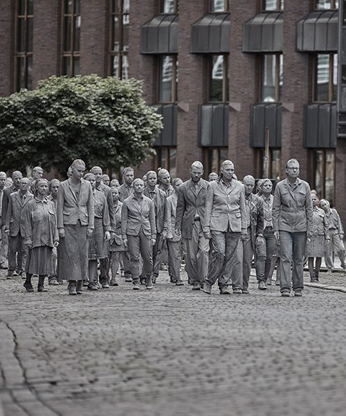 1000 ghostly figures march the streets of hamburg in protest for the G20 summit