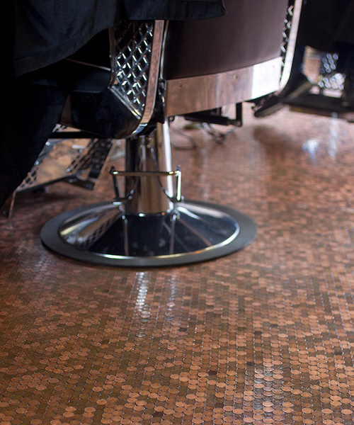 barber shop owner covers floor with 70000 pennies