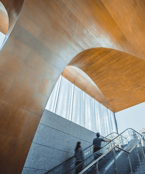 UAP's emergence installation unveils a captivating brass entry canopy