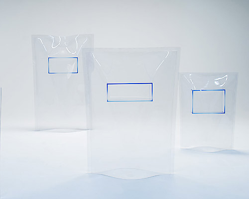 acrylic boxes and vinyl bags are combined into unusual freestanding structures