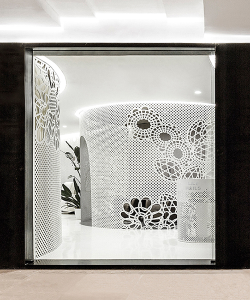 archstudio adorns lily nails salon in beiing with all-white lace patterns