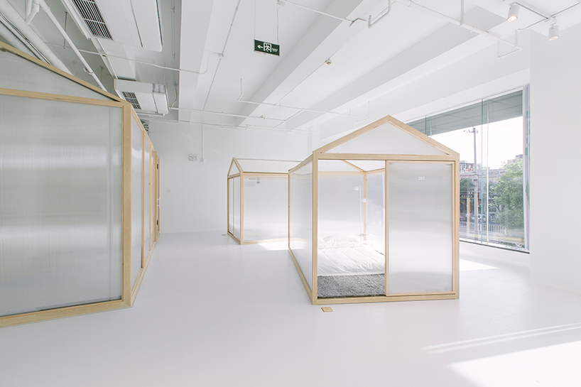 cao pu pitches tent structures inside together hostel in beijing