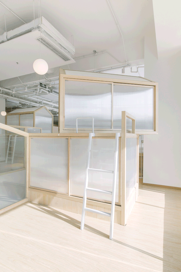 cao pu pitches tent structures inside together hostel in beijing