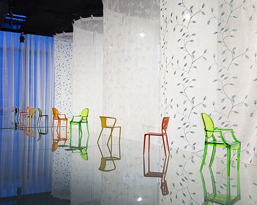 atelier tho.A drapes gamma’s office space with translucent ‘fabric walls’