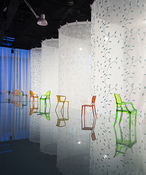 atelier tho.A drapes gamma’s office space with translucent ‘fabric walls’
