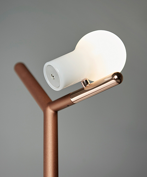GYRO's myna lamp greets you in the hallway like a bird perched on a branch