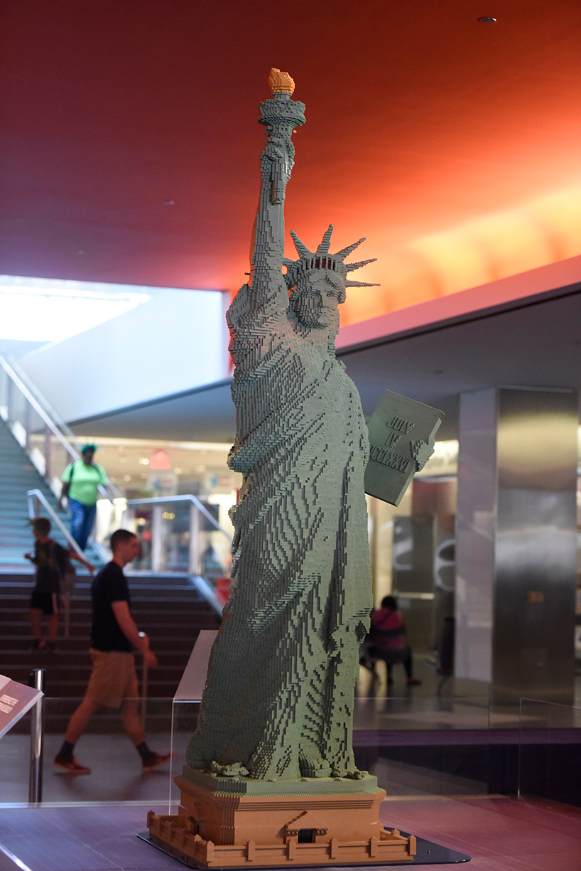 9 foot statue of liberty greets visitors into museum of american history