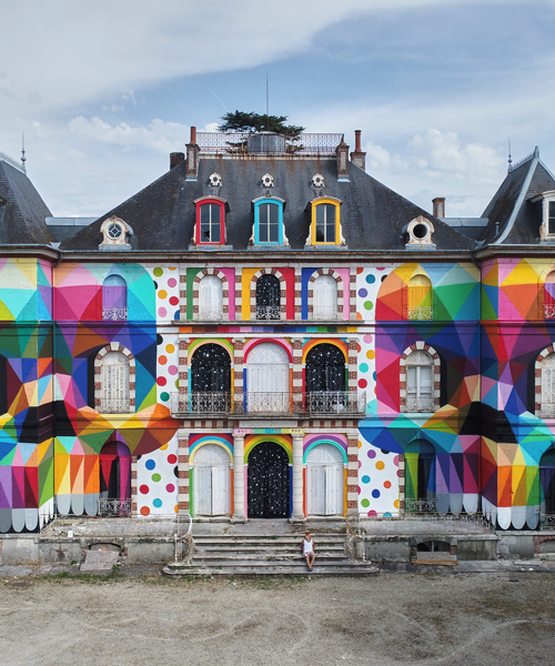 okuda san miguel canvasses 19th century castle with mulitcolored mirrored skulls