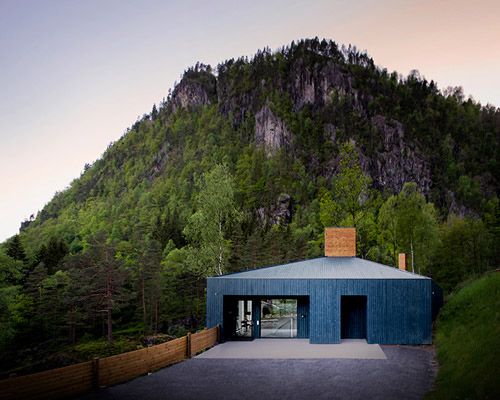 rever & drage perches kvåsfossen visitor center on a clifftop in southern norway