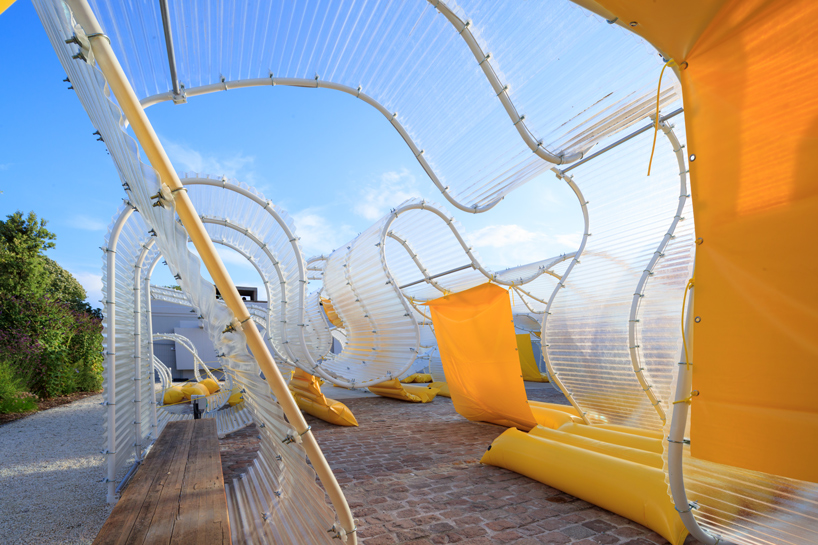 selgascano invades fondation d’entreprise martell's courtyard with transparent pavilion