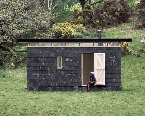TRIAS' slate cabin fits perfect in the welsh highlands
