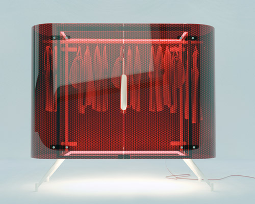 alex schulz adds a statement spotlight to the traditional armoir