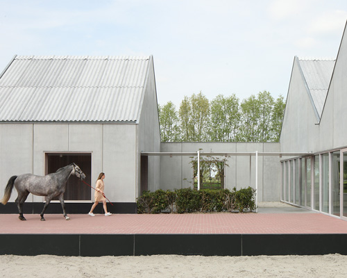 URA contains restaurant in belgium within four gabled concrete volumes