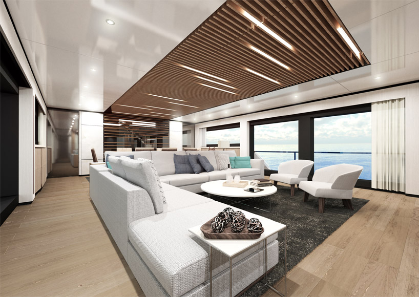 sporty-styled wider 130 yacht sails with waterside beach club