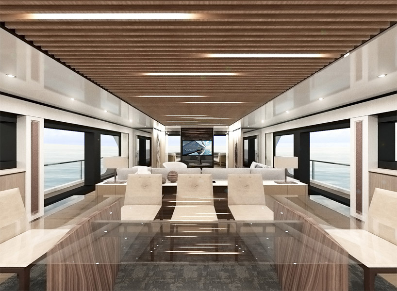 sporty-styled wider 130 yacht sails with waterside beach club