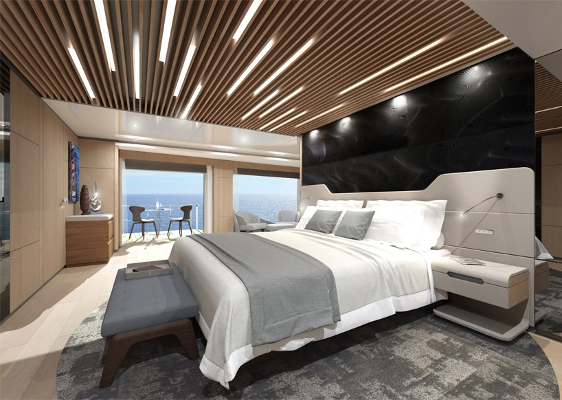 sporty-styled wider 130 yacht sails with waterside beach club