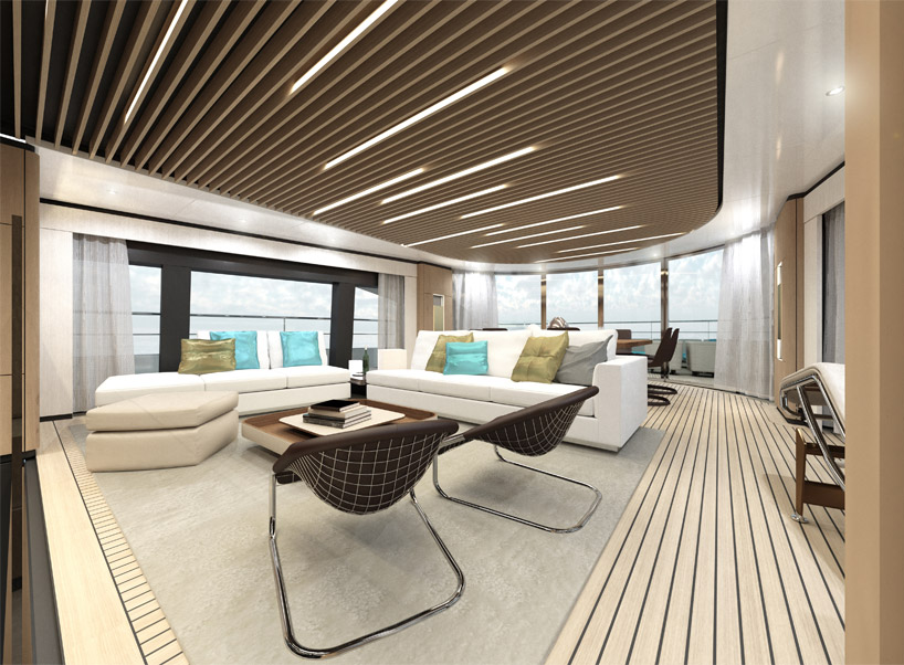 sporty-styled wider 130 yacht sails with waterside beach club