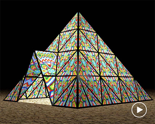 burning man anticipates dicapria's 14-foot tall gummy bear light installation