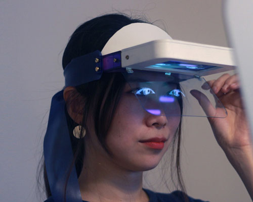 eun kyung shin's social mask is an AI gadget that displays human emotion in real time