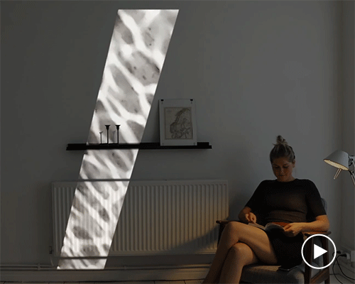 leslie nooteboom's 'komorebi' lamp projector plays video looped light-patterns