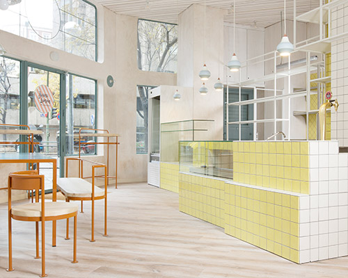 lucas y hernández-gil covers madrid bakery in hand-painted tiles