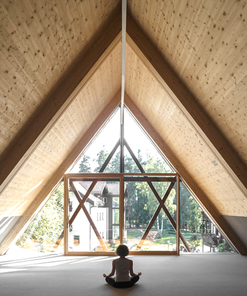 messner architects situates its newly renovated saint joseph chapel in the alpine woods