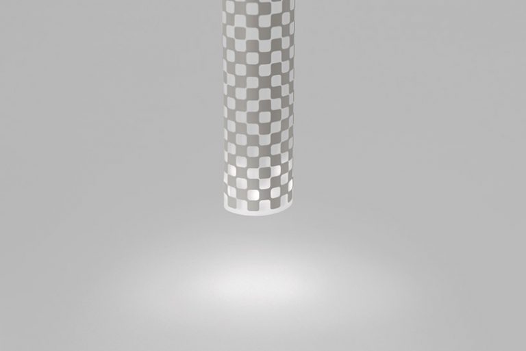 nendo's paper torch is an electronic paper that rolls itself up into a lamp