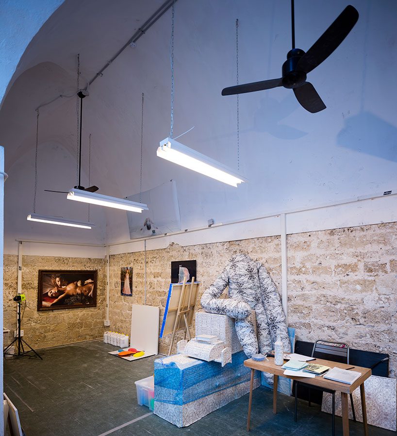 opa architects repurpose war-torn house into a rustic resto-pub in jeffa