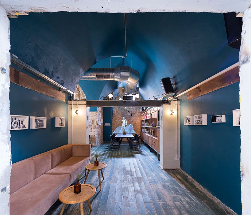 opa architects repurpose war-torn house into a rustic resto-pub in jeffa