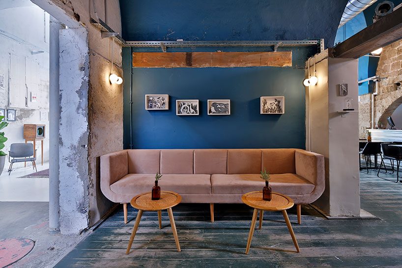 opa architects repurpose war-torn house into a rustic resto-pub in jeffa