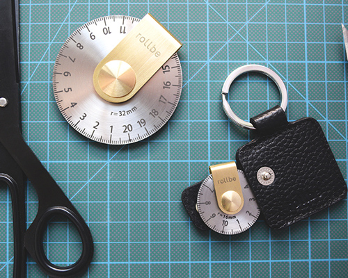 the compact 'rollbe' measuring tool is no larger than a coin