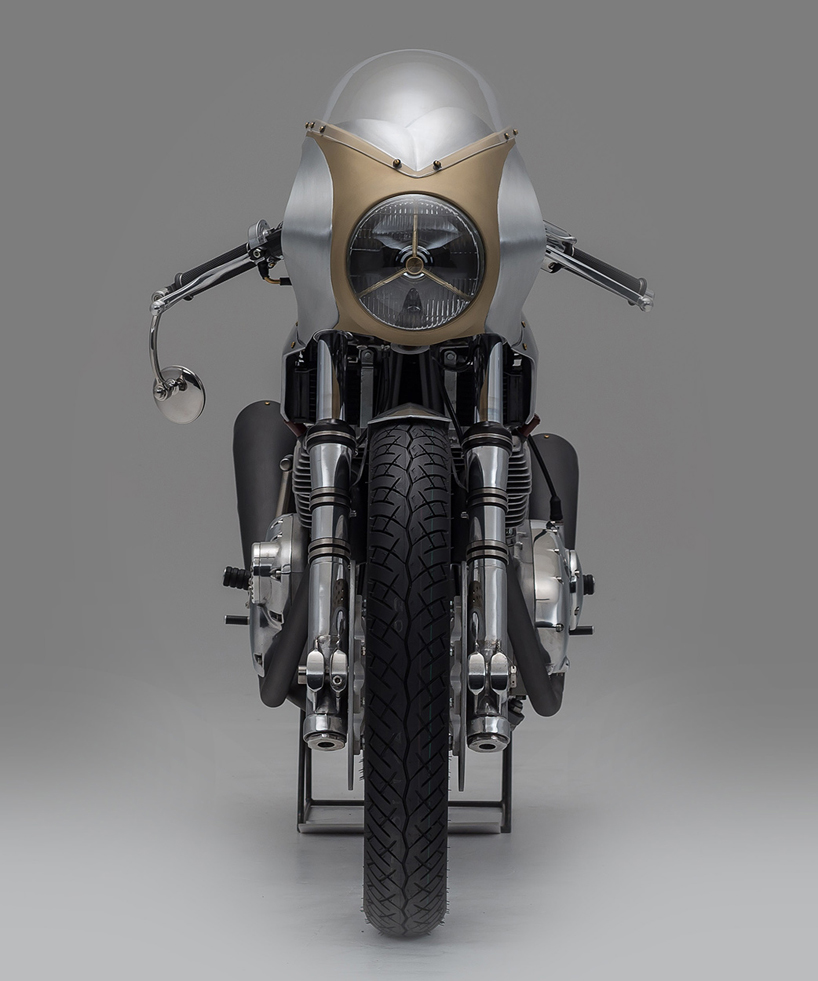 the triumph rafale custom motorcycle by storik is a bare metal café racer