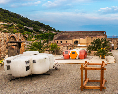 futuristic micro-homes land in marseille for 'utopie plastic' exhibition amid stone ruins