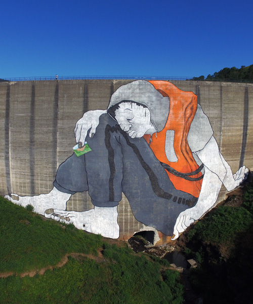 ella & pitr's tired giant transforms abandoned dam wall into artistic canvas in france