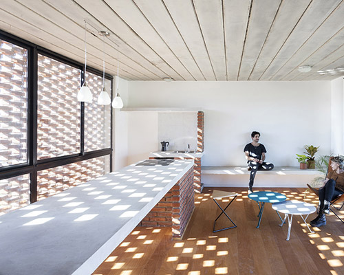 estudio papa uses brick and local techniques to integrate casa TR to buenos aires' urban sprawl