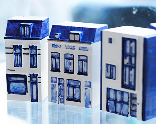 local makers hand-paint customized, miniature 3D printed delft houses