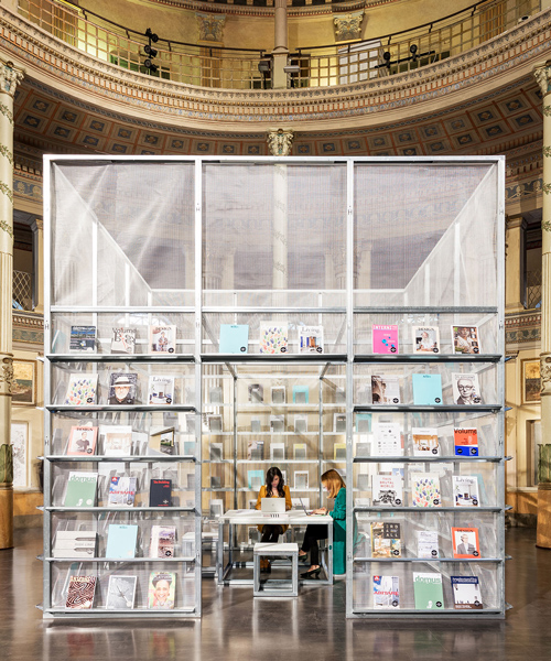 SET architects constructs pop-up newsstand inside the acquario romano in rome
