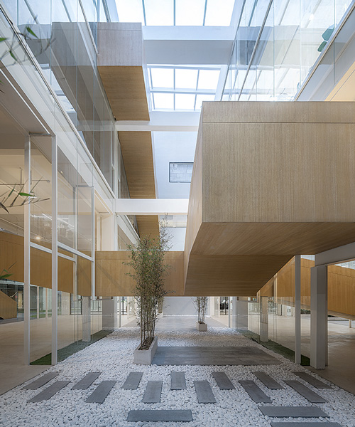 LYCS architecture converts chinese textile warehouse into multi-purpose office building