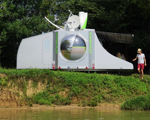 the scarabane is a self sufficient 360 degree rotating caravan